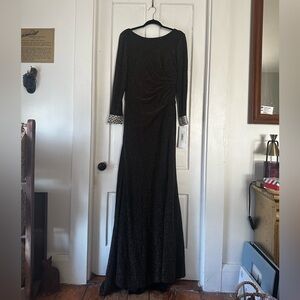 Golden floor length gown with beaded sleeve details